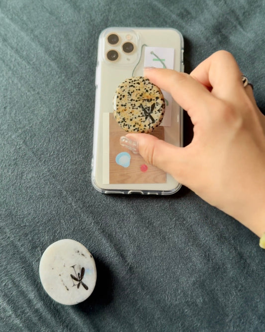 Nyxu logo stone grip