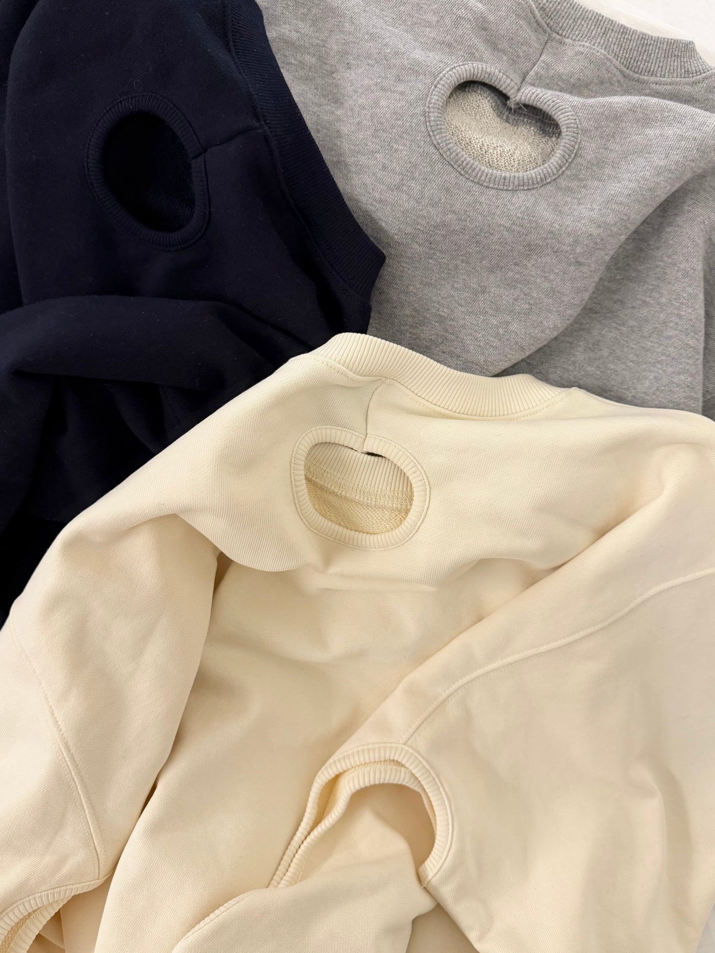 Maru sweat tops