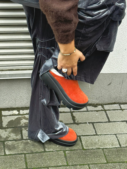 Red slip-on shoes